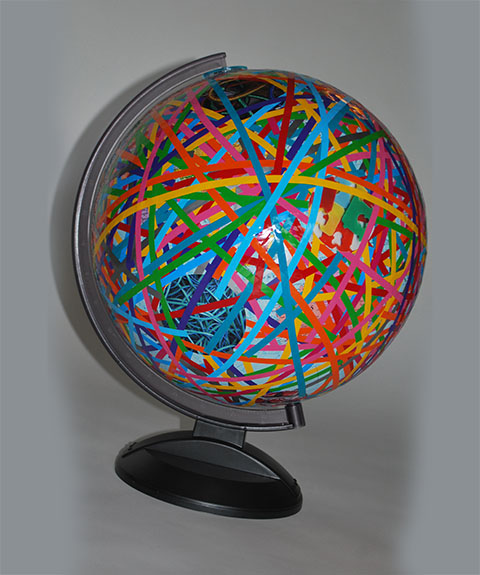 Spinning globe, vinyl color stripes & prints / 20” diam x 25” tall (aprox) /2009 /